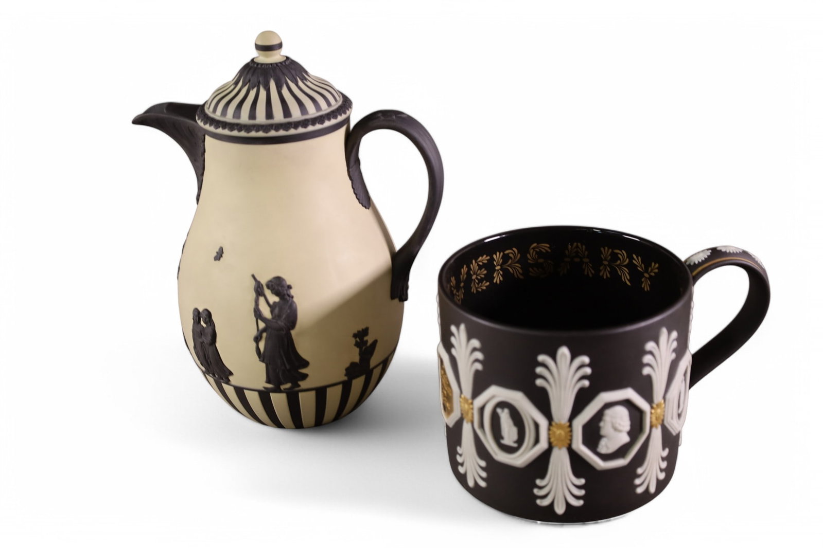 2 PIECES OF WEDGWOOD: WHITE AND BLACK JASPER MUG & PRIMROSE BASALT COFFEE MUG.