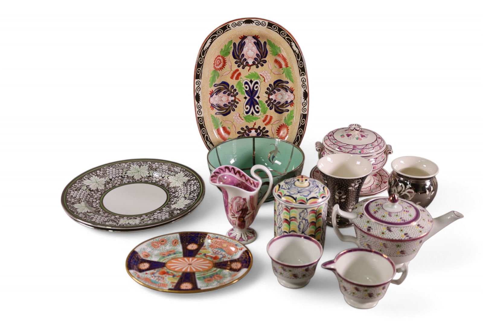 14 PIECES OF WEDGWOOD LUSTERWARE: PLATES, PLATTERS, CUPS, AND MORE.