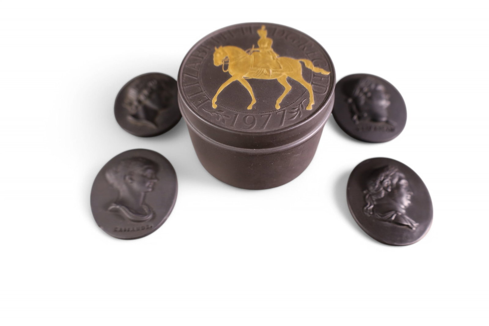 5 PIECES OF WEDGWOOD BASALT: 4 MEDALLIONS & COVERED BOX.
