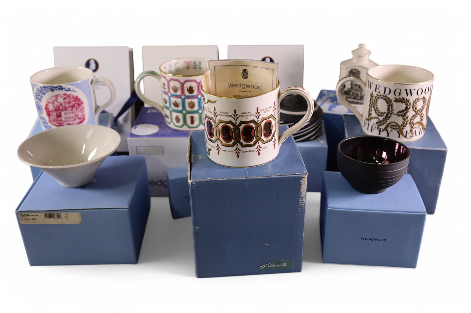 LARGE GROUPING OF WEDGWOOD: DISHES, MUGS, BOWLS, AND MORE. SOME WITH ORIGINAL BOXES.