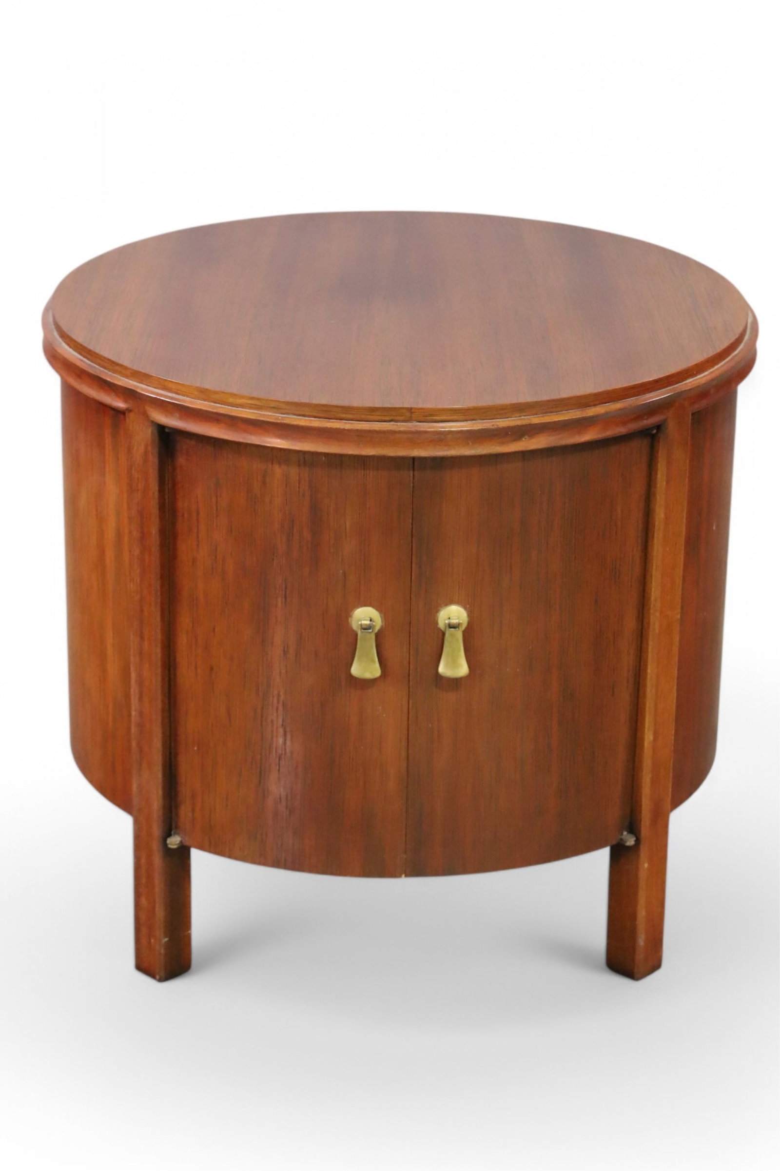 MID CENTURY MODERN SIDE TABLE: MID CENTURY MODERN TWO DOOR SIDE TBALE, 22" DIAM x 20" H. THIS ITEM EXCEEDS SIZE LIMITATIONS FOR IN HOUSE SHIPPING, MUST BE PICKED UP IN HOUSE OR SHIPPED VIA A 3rD PARTY SHIPPER.