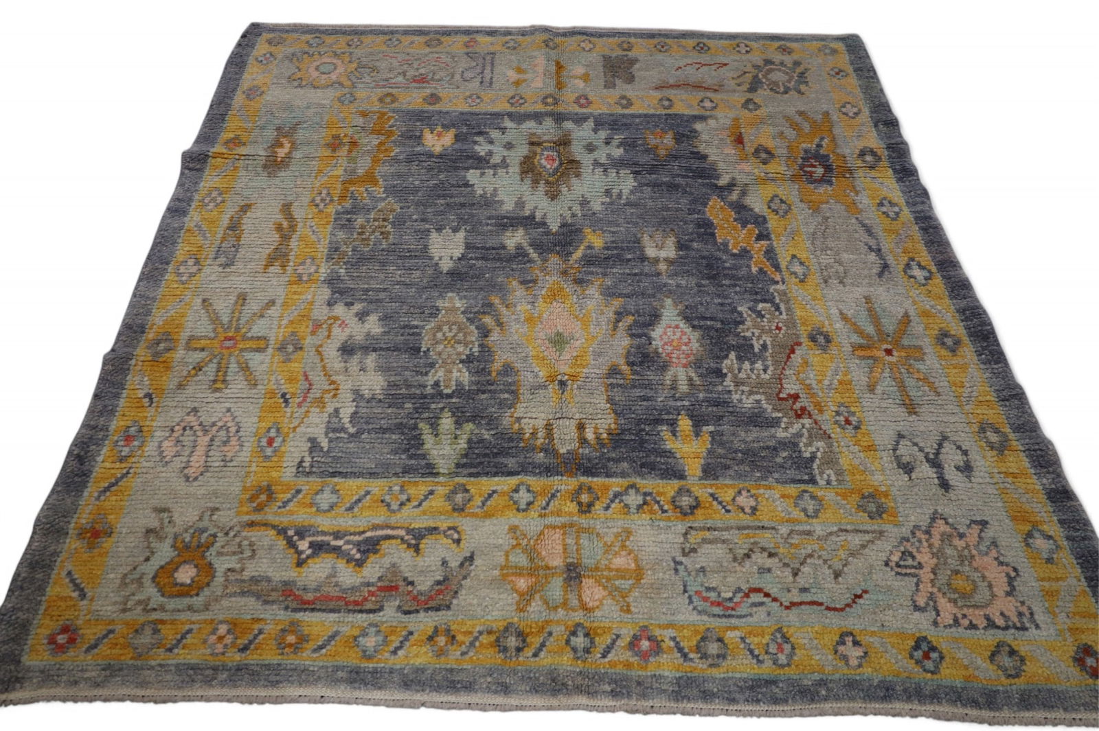 APPROX 6' 2" x 5' 7" HANDMADE WOOL RUG (1 of 2)