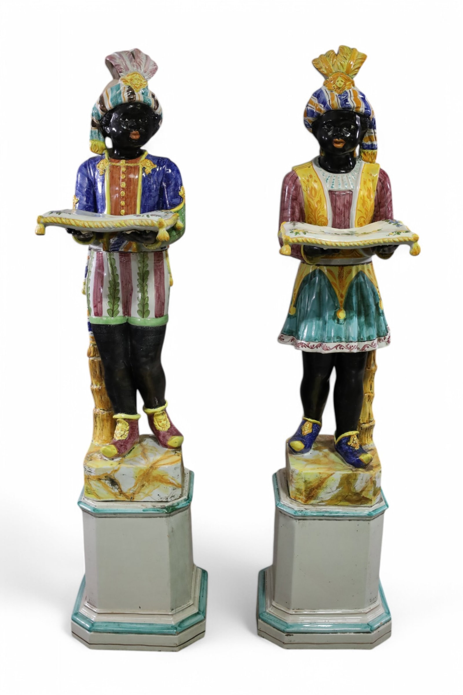 TERRA COTTA BLACKAMOOR FIGURES: LARGE HAND PAINTED ITALIAN TERRA COTTA BLACKAMOOR FIGURES REPAIRS TO ONE HAND & BOTH PILLOWS. SOME CHIPS ALONG BASE. 56" H. THIS ITEM EXCEEDS SIZE LIMITATIONS FOR IN HOUSE SHIPPING, MUST BE PICKED UP 