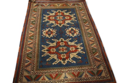 APPROX 4' 9" x 6' 6" HANDMADE WOOL RUG