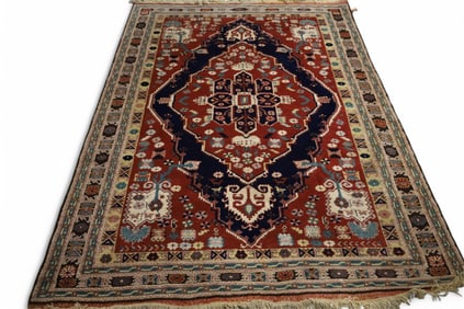 APPROX 6' 6" x 8' HANDMADE WOOL RUG