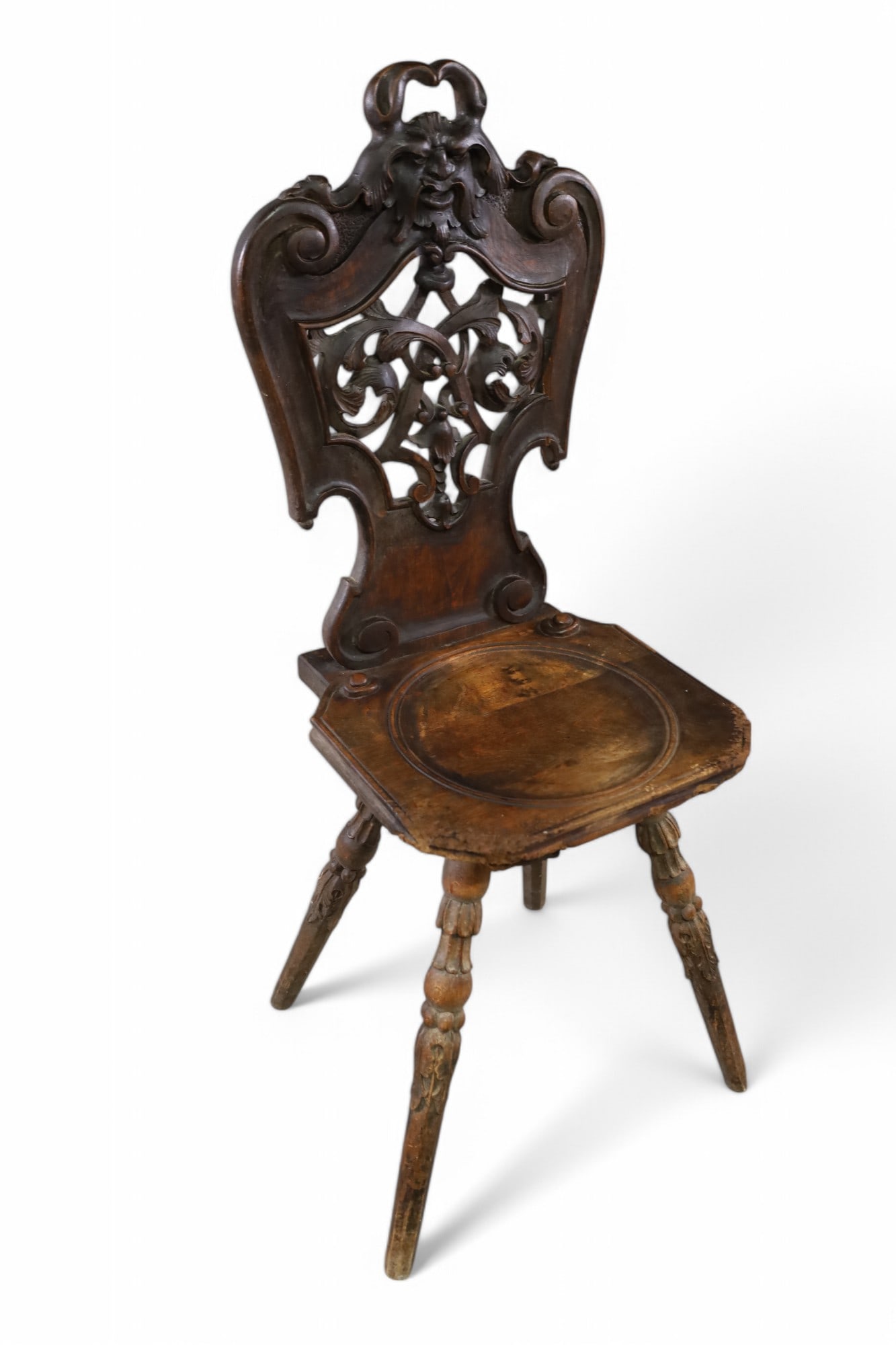 SPANISH STYLE SIDE CHAIR: CARVED SPANISH STYLE SIDE CHAIR, WEAR TO FINISH, DAMAGE TO CORNERS. 14" W x 14" D x 29" H. THIS ITEM EXCEEDS SIZE LIMITATIONS FOR IN HOUSE SHIPPING, MUST BE PICKED UP IN HOUSE OR SHIPPED VIA A 3RD PAR