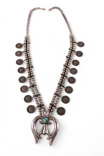 NATIVE AMERICAN SQUASH BLOSSOM: HANDMADE DOUBLE BEADED NATIVE AMERICAN SQUASH BLOSSOM, WITH 16 MERCURY DIMES, SILVER AND TURQUOISE PENDANT. 30" L.