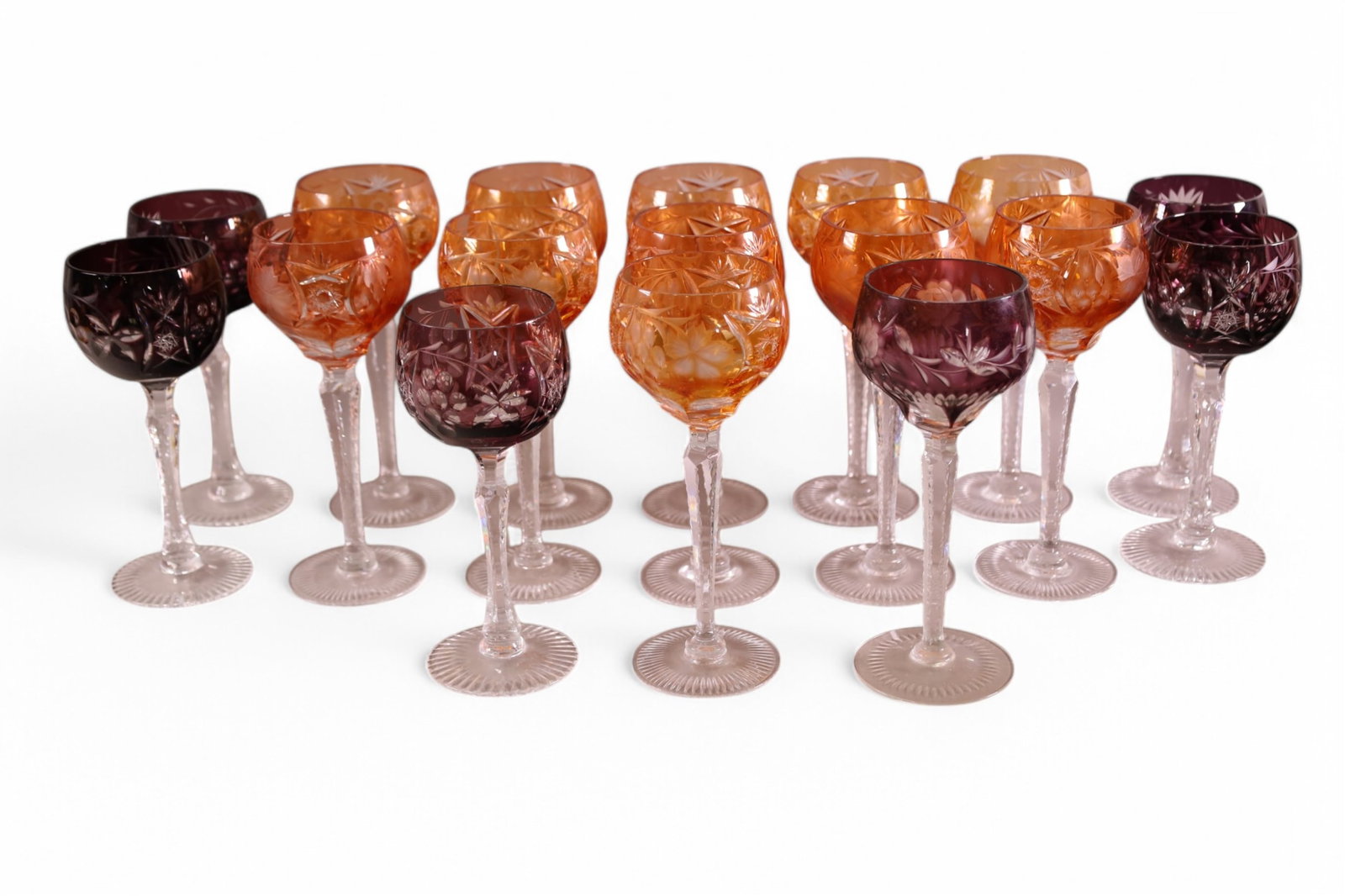 COLLECTION OF BOHEMIAN STEMS: 17 AMBER CUT TO CLEAR & AMETHYST CUT TO CLEAR. 8 1/2" & 7 1/2" H