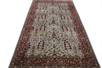 APPROX 5' x 8' 2" HANDMADE WOOL RUG