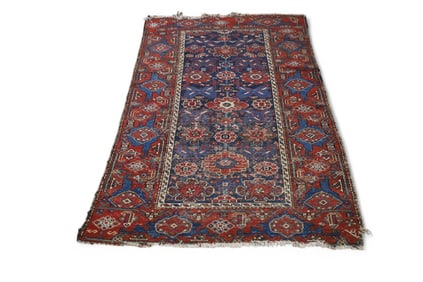 APPROX 3' 4" x 5' 10" HANDMADE WOOL RUG