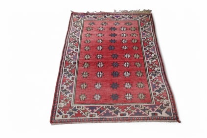 APPROX 2' 9" x 4' 3" HANDMADE WOOL RUG