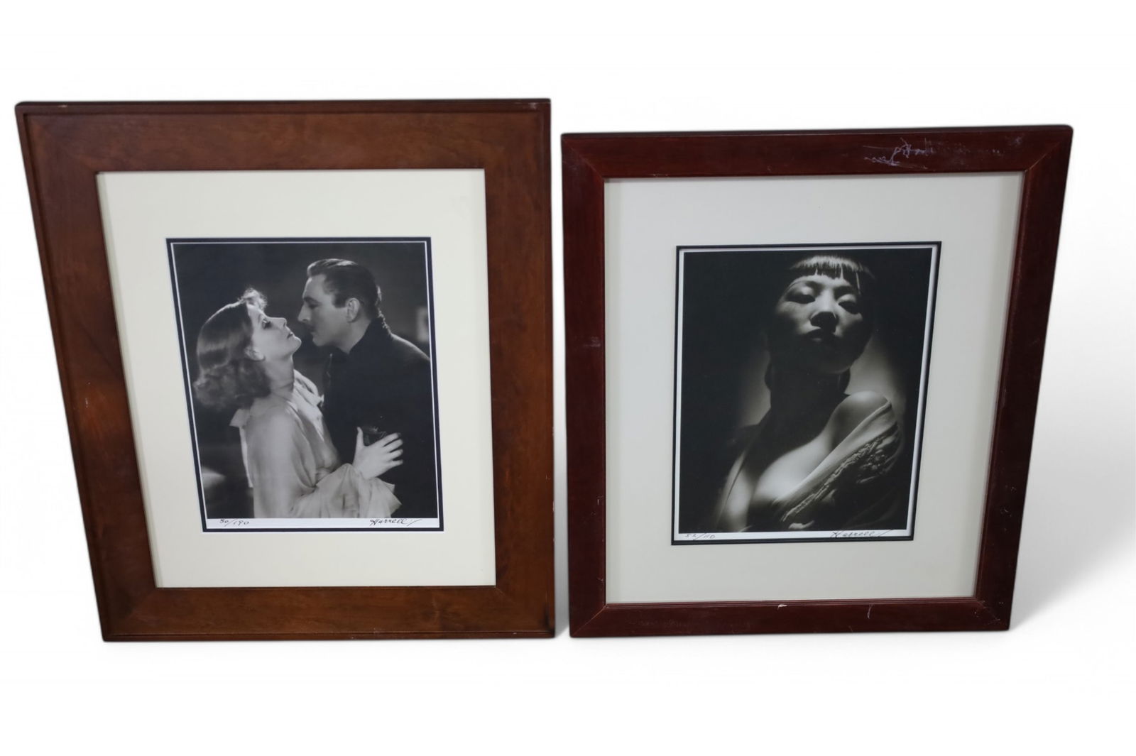 2 GEORGE HURRELL PHOTOGRAPHS: FRAMED PHOTOGRAPHS BY GEORGE HURRELL. SCUFFS TO FRAMES. 21" x 24" & 21" x 25" IN FRAME.