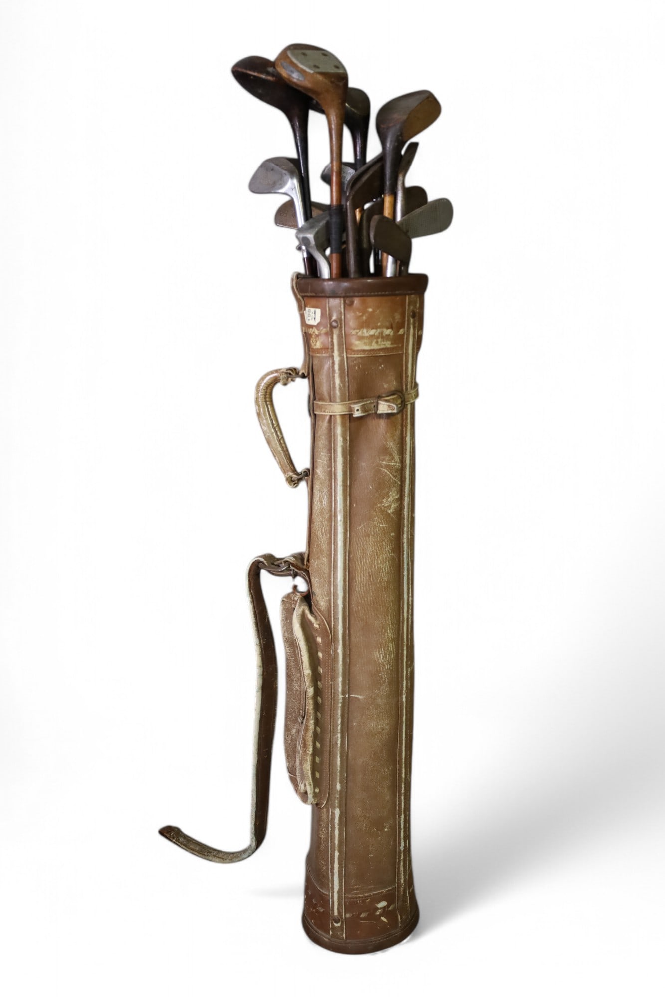 SET OF ANTIQUE GOLF CLUBS: SET OF ANTIQUE GOLF CLUBS IN BAG. 15 CLUBS. WOODS AND IRONS. THIS ITEM EXCEEDS SIZE LIMITATIONS FOR IN HOUSE SHIPPING, MUST BE PICKED UP IN HOUSE OR SHIPPED VIA 3rd PARTY GROUND SHIPPER.