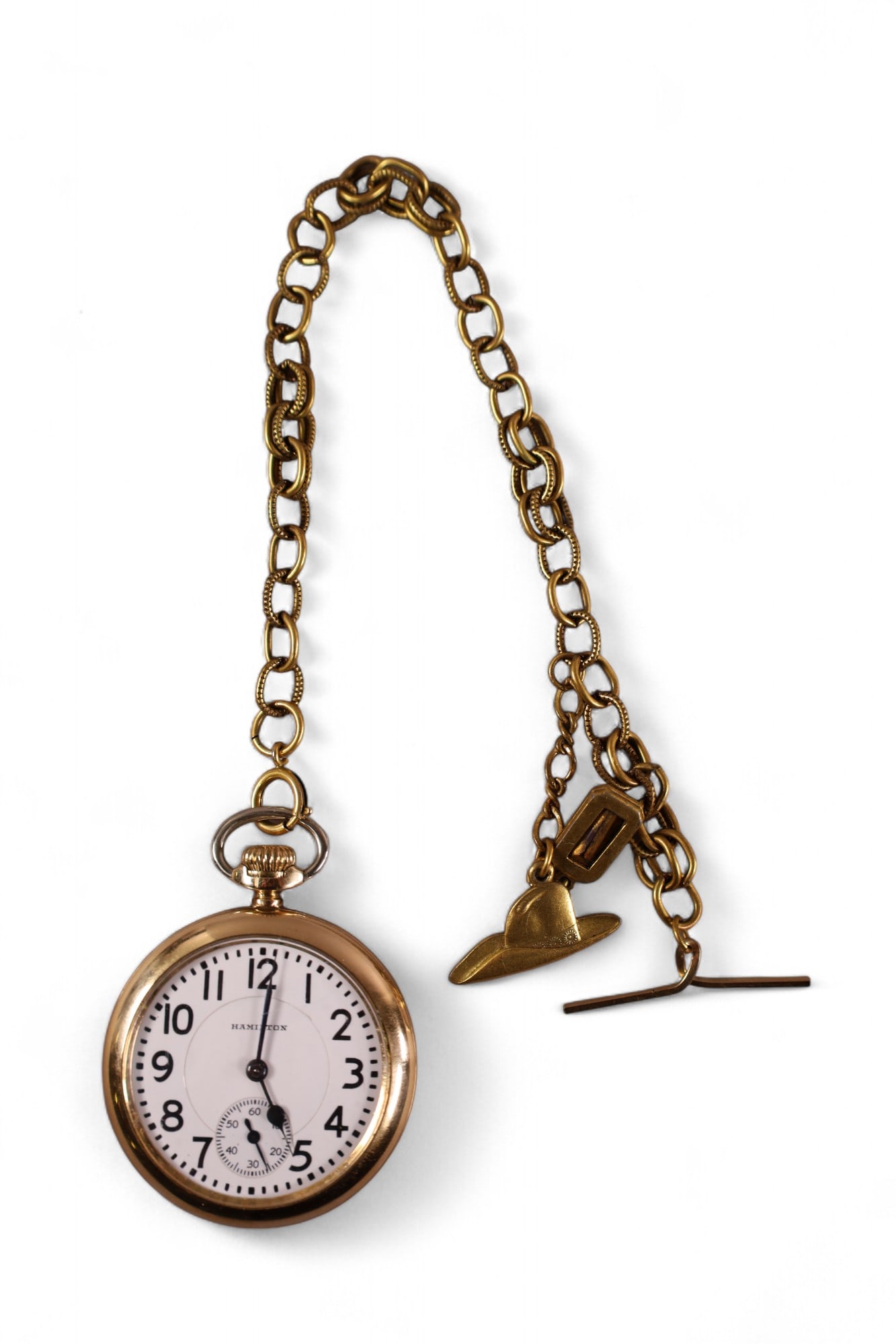 HAMILTON POCKET WATCH: GOLD FILLED HAMILTON POCKET WATCH WITH FOB. ALL WATCHES ARE SOLD AS IS, UNSERVICED, WE DO NOT GUARANTEE WORKING ORDER.
