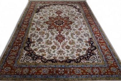 APPROX 9' 2" x 6' 5" HANDMADE WOOL RUG