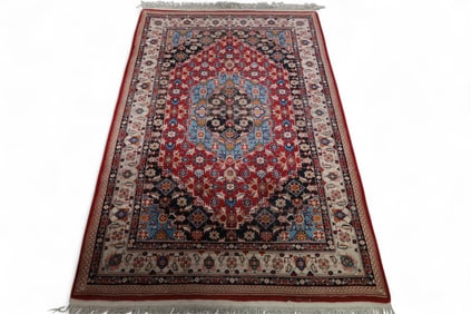APPROX 5' 10" x 3' 9" HANDMADE WOOL RUG