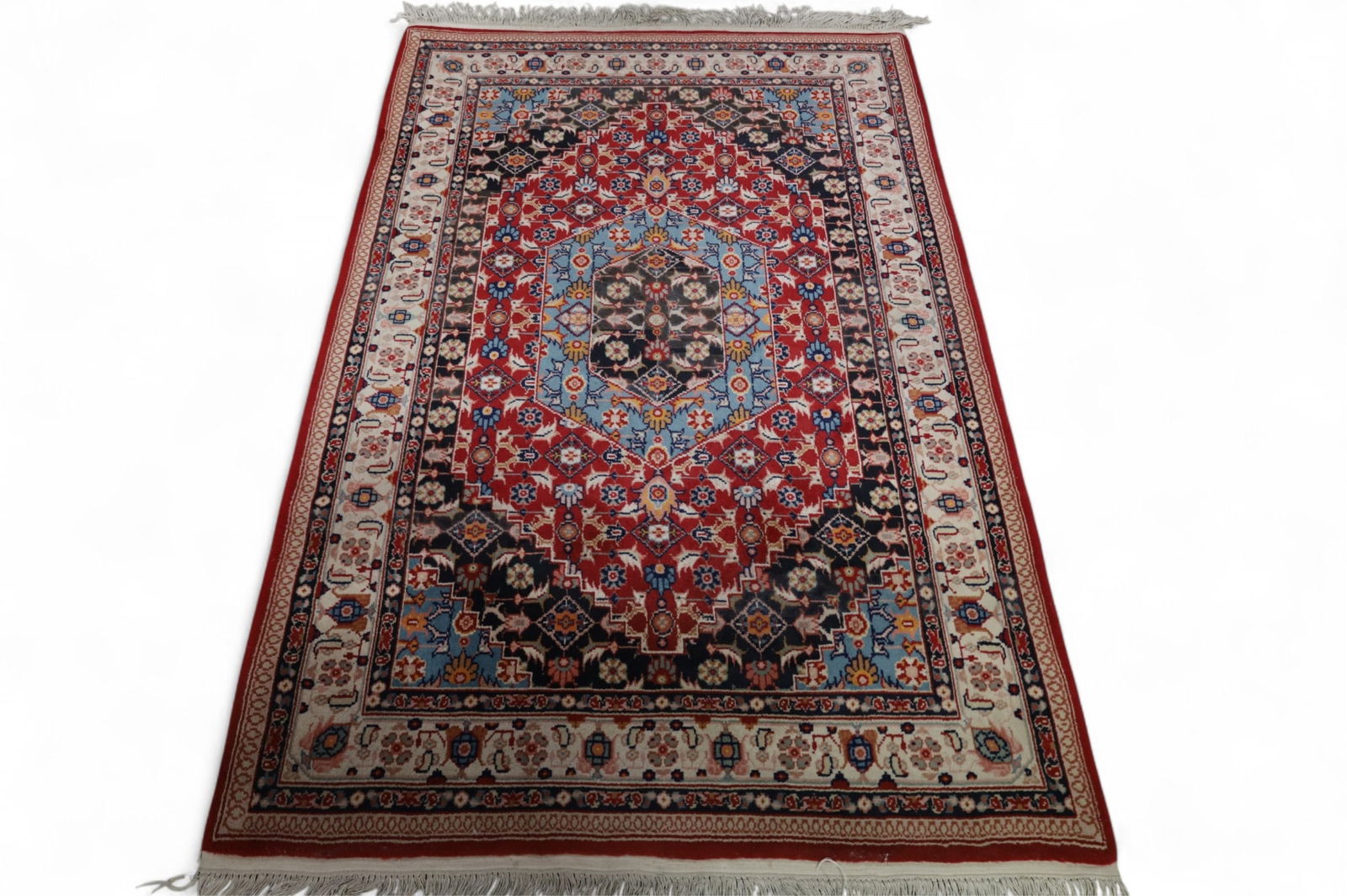 APPROX 5' 10" x 3' 9" HANDMADE WOOL RUG (1 of 2)