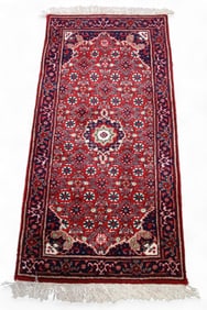 APPROX 4' 5" x 2' 1" HANDMADE WOOL RUG