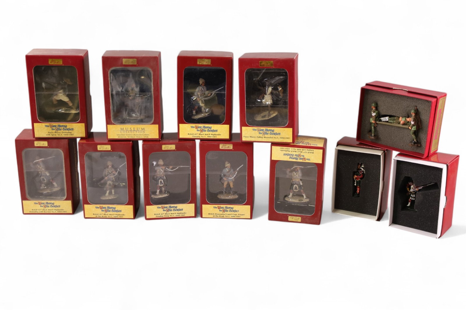 12 MINIATURE BRITAIN SOLDIERS: 12 BRITAIN SOLDIERS. IN BOXES.