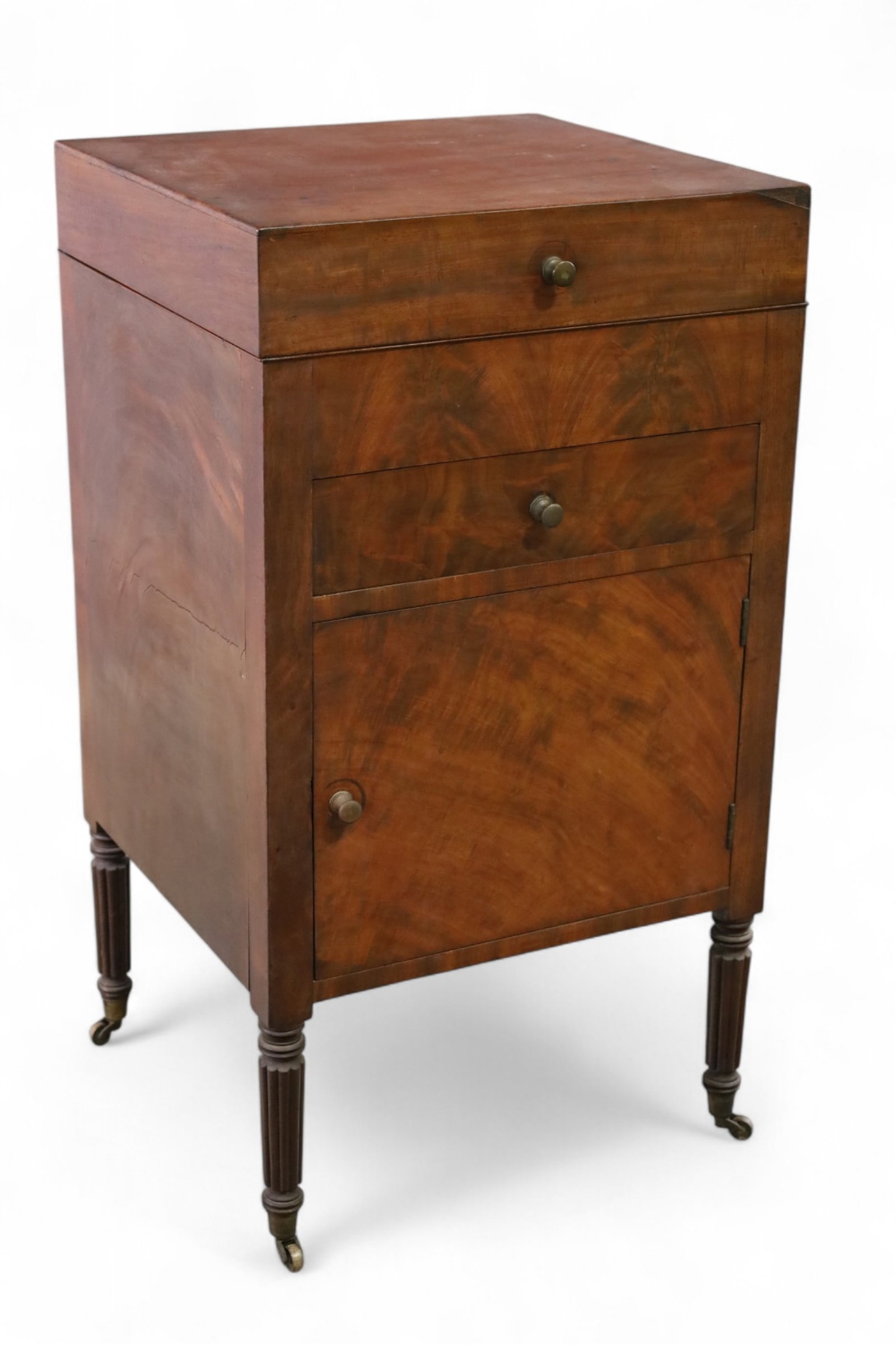 19TH CENTURY MAHOGANY WASHSTAND: HINGED LID TOP, SINGLE DRAWER, SINGLE DOOR WASHSTAND, AGE SPLIT, VENEER CHIP. MISSING INSERTS. 18" W x 17" D x 33" H. THIS ITEM EXCEEDS SIZE/WEIGHT LIMITATIONS FOR IN HOUSE SHIPPING, MUST BE PICKED UP