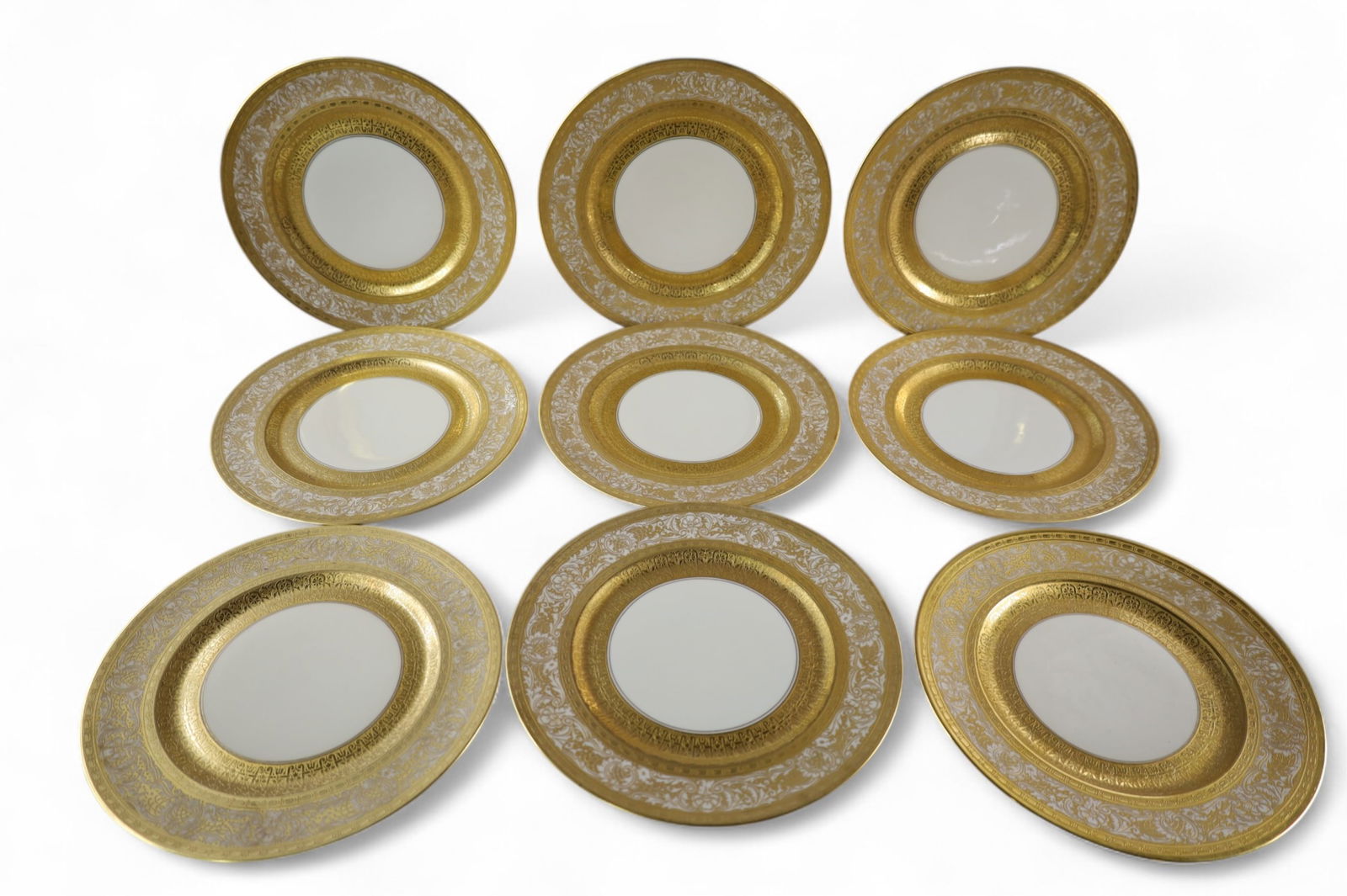 9 BAVARIAN DINNER PLATES: 9 HEINRICH & CO BAVARIAN DINNER PLATES, GOLD DECORATED. 11" DIAM.