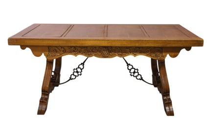 LARGE CARVED TRESTLE BASE OAK DINING TABLE