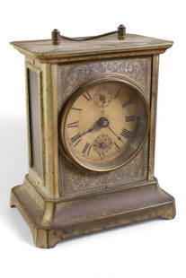 JUNGHANS CARRIAGE CLOCK: TIN CASED JUNGHANS CARRIAGE CLOCK, ALL CLOCKS ARE SOLD AS IS, UNSERVICED, WE DO NOT GUARANTEE WORKING ORDER. 5" x 6"