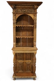 ANTIQUE HIGHLY CARVED TALL BOOKCASE