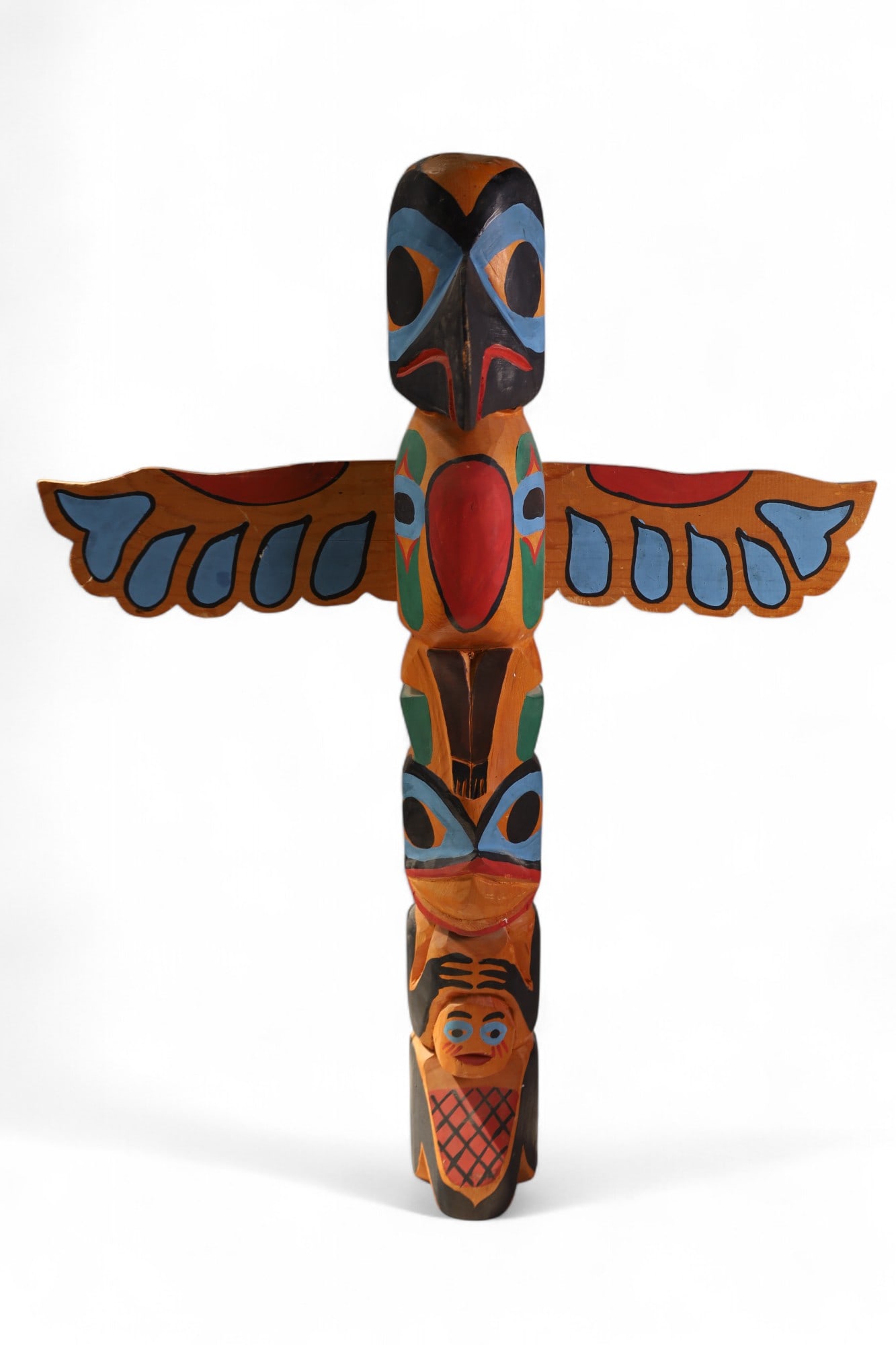 TOTEM POLE: CARVED WOOD HAND PAINTED TOTEM POLE. 19" W x 25" H.