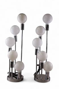 PAIR OF CHROME TABLE LAMPS: PAIR OF CHROME AND GLASS BALL SHADE TABLE LAMPS, IN THE STYLE OF ROBERT SONNEMAN. 33" H.