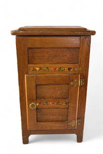 SALESMAN SAMPLE ICE BOX: EARLY SALESMAN SAMPLE ICE BOX, GINGERBREAD, PANELED SIDES, FLORAL PAINTED DECORATION. REPLACED HANDLE. 12" W x 10" D x 22" H.