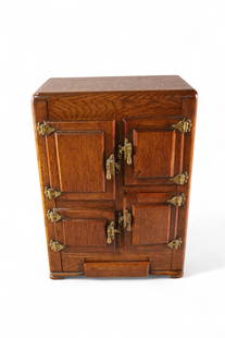 SALESMAN SAMPLE ICE BOX: EARLY SALESMAN SAMPLE ICE BOX, 4 DOOR, WITH RACKS. ENAMEL INTERIOR. 12" W x 7" D x 16" H.