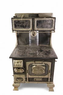 "MAJESTIC" JUNIOR STOVE: LARGE CAST IRON "MAJESTIC" JUNIOR CHILDS OR SALESMAN SAMPLE STOVE, 17 1/2" W x 14" D x 31" H. THIS ITEM EXCEEDS SIZE OR WEIGHT LIMITATIONS FOR IN HOUSE SHIPPING, MUST BE PICKED UP IN HOUSE OR SHIPPED