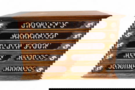 CROWLEY'S NEEDLE CABINET: 5 DRAWER CROWLEYS NEEDLE CABINET, GLASS FRONT DRAWERS. 22" W X 15" D x 14" H. THIS ITEM EXCEEDS SIZE OR WEIGHT LIMITATIONS FOR IN HOUSE SHIPPING, MUST BE PICKED UP IN HOUSE OR SHIPPED VIA 3rd PARTY SH