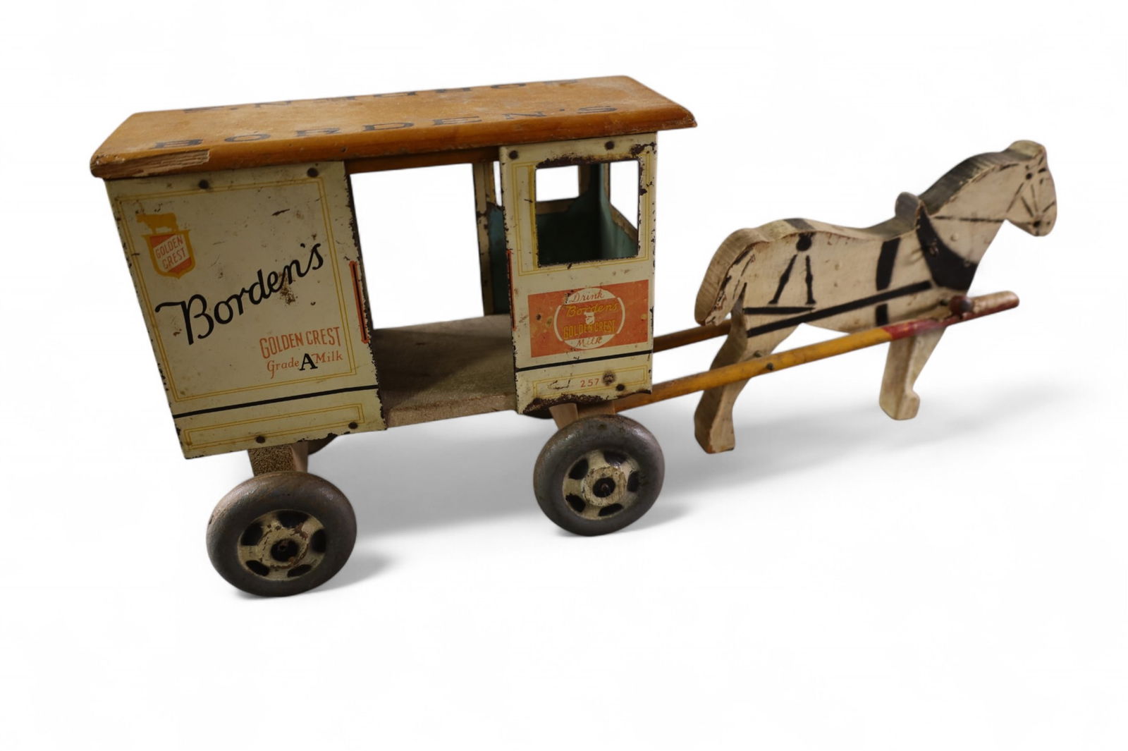 BORDENS MILK CART: HORSE DRAWN BORDENS MILK WAGON, PAINT LOSS. 19" L.