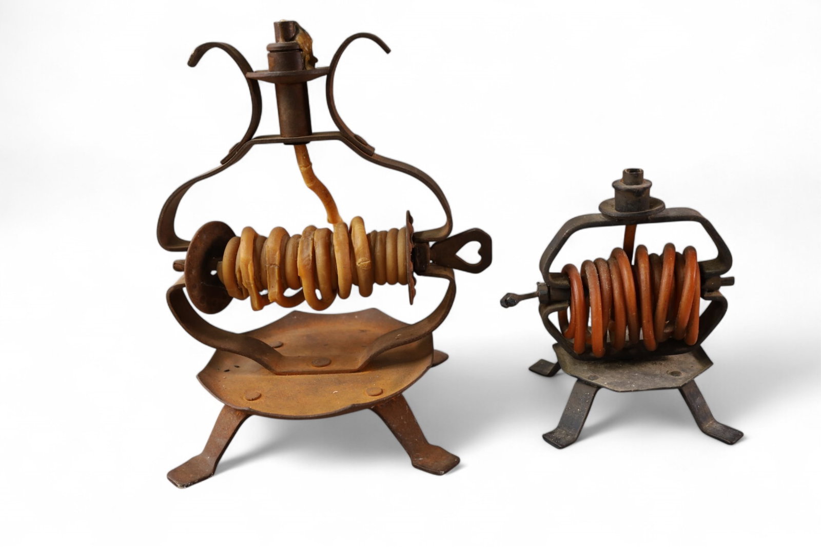 BEESWAX CANDLE COIL HOLDERS: 2 ANTIQUE BEESWAX CANDLE COIL HOLDER OR WAX JACK. 7" & 11" H