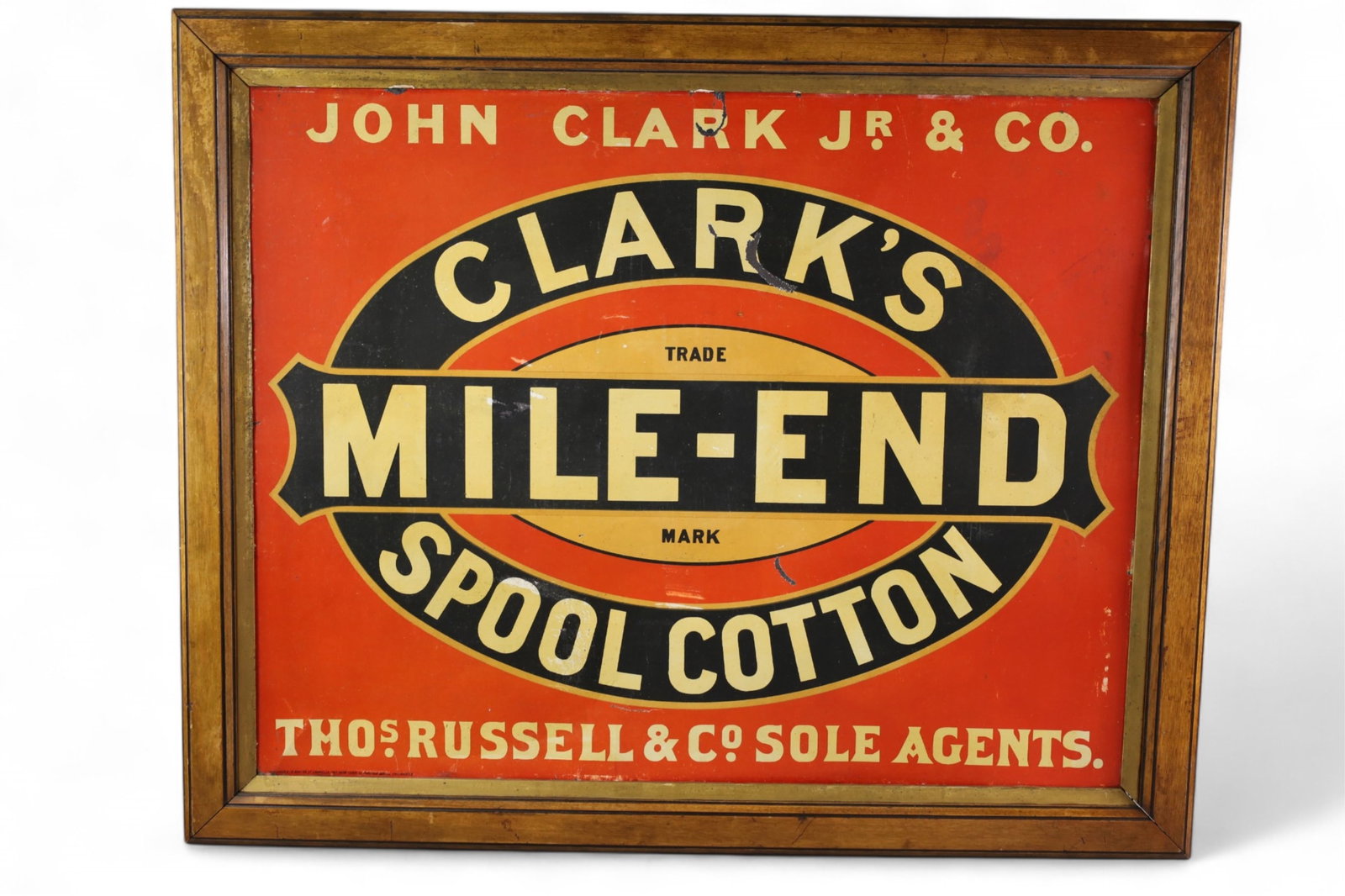 CLARK'S SPOOL SIGN: CLARK'S PAINTED TIN SPOOL SIGN, IN WOODEN FRAME, PAINT LOSS, SCRATCHES. 35" x 28"