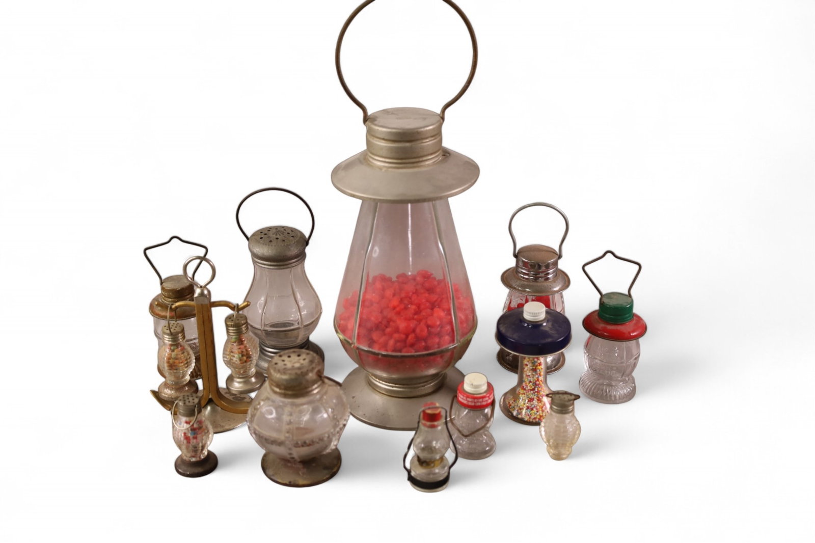 COLLECTION OF CANDY CONTAINERS: LANTERN FORM, WITH HANDLES.