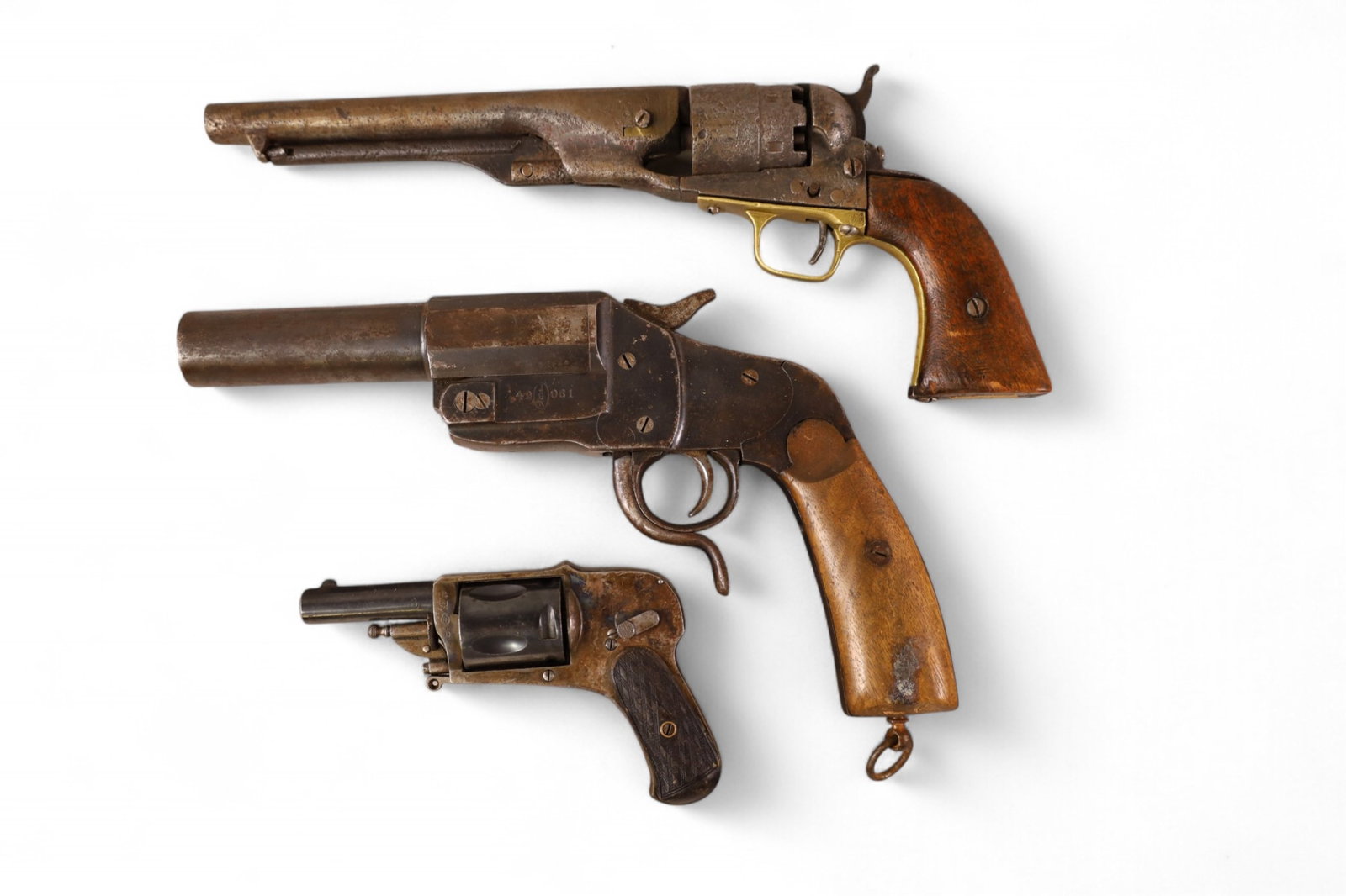 3 ANTIQUE WALL HANGING PISTOLS: FLARE GUN & 2 PISTOLS, WALL HANGER PISTOLS. THIS ITEM EXCEEDS SIZE OR WEIGHT LIMITATIONS FOR IN HOUSE SHIPPING, MUST BE PICKED UP IN HOUSE OR SHIPPED VIA 3rd PARTY SHIPPER.