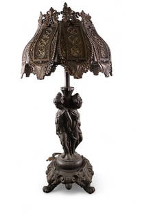 FIGURAL TABLE LAMP: SPELTER FIGURAL TABLE LAMP WITH METAL FILIGREE AND SLAG SHADE. 25" H.