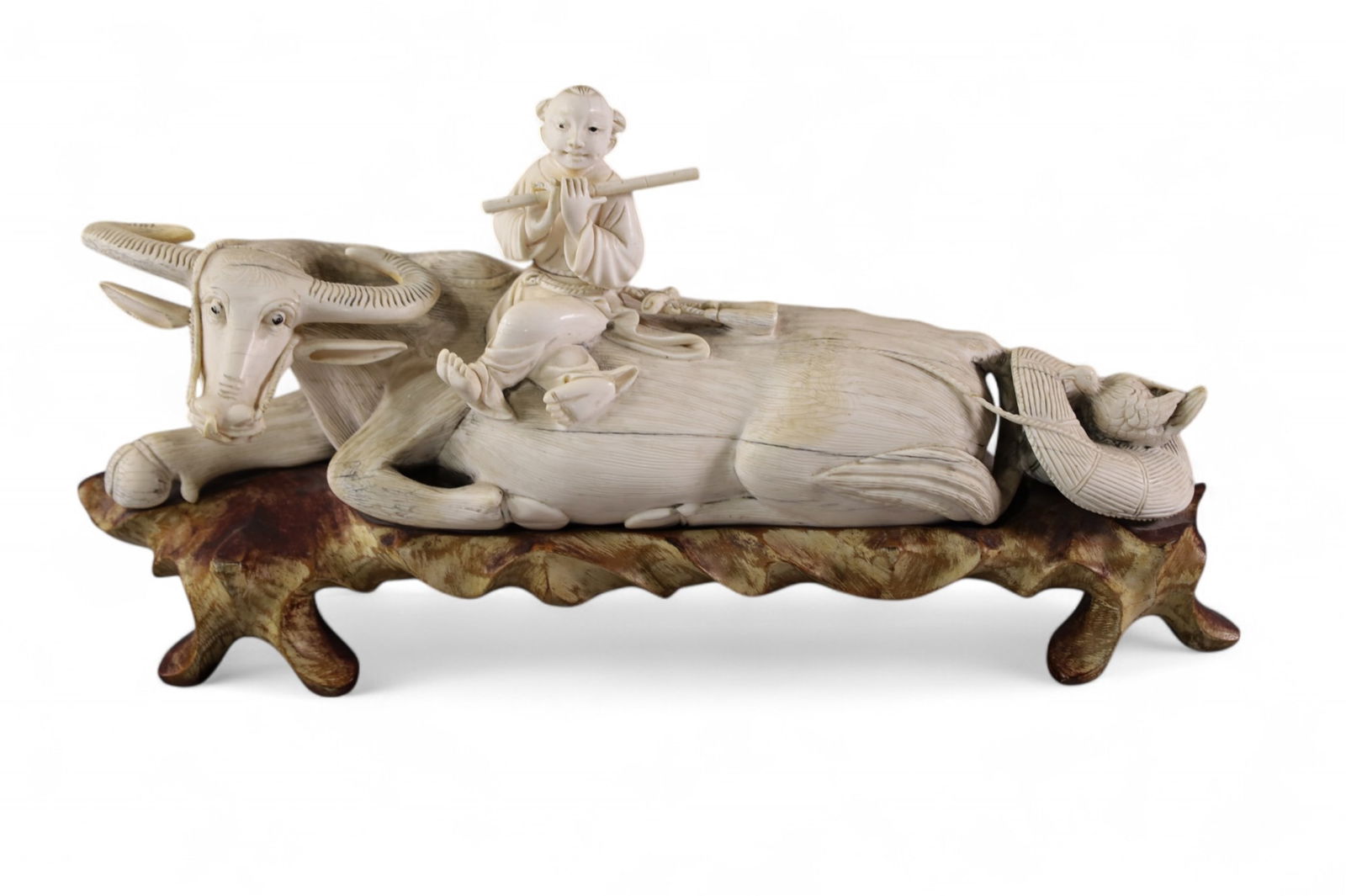 CHINESE CARVED WATER BUFFALO: LARGE CARVED BONE CHINESE WATER BUFFALO ON WOODEN BASE, 14" L.