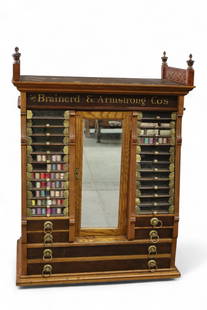 LARGE GENERAL STORE SPOOL CABINET: LARGE MULTI DRAWER GENERAL STORE SPOOL CABINET, BRAINERD & ARMSTRONG CO. MISSING TOP FRONT GALLERY CARVING. 35" W x 20" D x 47" H. THIS ITEM EXCEEDS SIZE OR WEIGHT LIMITATIONS FOR IN HOUSE SHIPPING, M