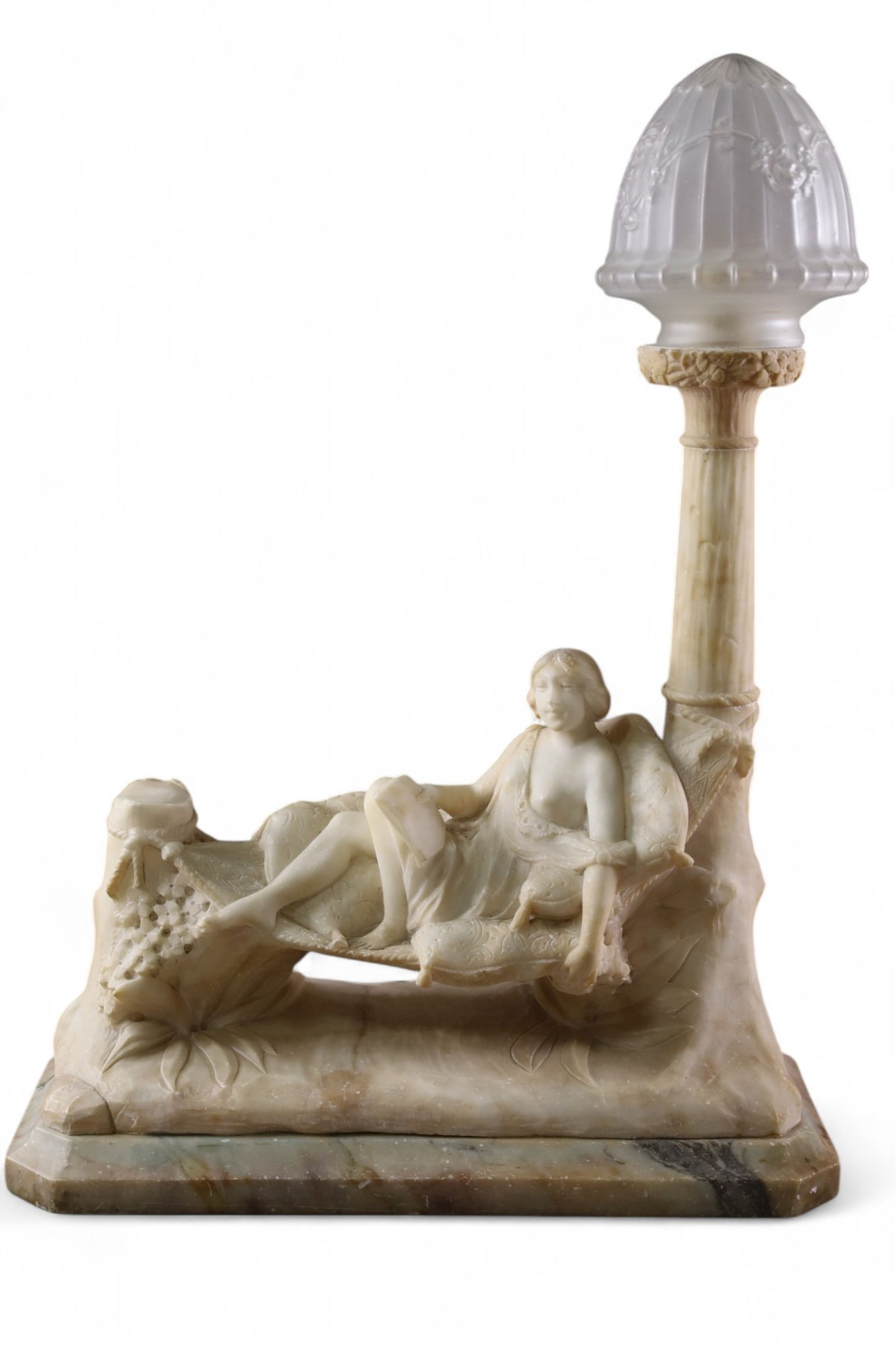 ALABASTER FIGURAL LAMP: LARGE ALABASTER RECLINING NUDE FIGURE TABLE LAMP. SIGNED FERUZZI, MINOR CHIPS ALONG EDGE, REPLACED SHADE WITH GLASS. 19" W x 24" H. THIS ITEM EXCEEDS SIZE OR WEIGHT LIMITATIONS FOR IN HOUSE SHIPPING,