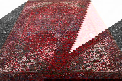 APPROX 12' 7" x 9' 8" HANDMADE WOOL RUG: HANDMADE HERIZ WOOL RUG, WEAR TO FRINGE.