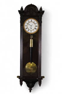 SINGLE WEIGHT REGULATOR WALL CLOCK: SINGLE WEIGHT REGULATOR WALL CLOCK, ROSEWOOD CARVED CASE. 41" H. ALL CLOCKS ARE SOLD AS IS, UNSERVICED, WE DO NOT GUARANTEE WORKING ORDER. THIS ITEM EXCEEDS SIZE OR WEIGHT LIMITATIONS FOR IN HOUSE SHI