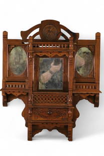 VICTORIAN AMERICAN OAK WALL SHELF MIRROR: HANGING OAK WALL MIRROR WITH LOWER DRAWER. DAMAGE TO TOP CARVING. 22" W x 27" H. THIS ITEM EXCEEDS SIZE OR WEIGHT LIMITATIONS FOR IN HOUSE SHIPPING, MUST BE PICKED UP IN HOUSE OR SHIPPED VIA 3rd PARTY