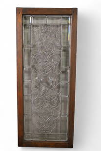 LEADED GLASS WINDOW: IN WOOD FRAME, LARGE LEADED GLASS WINDOW, SOME CRACKS. 19 1/2" x 48" THIS ITEM EXCEEDS SIZE OR WEIGHT LIMITATIONS FOR IN HOUSE SHIPPING, MUST BE PICKED UP IN HOUSE OR SHIPPED VIA 3rd PARTY SHIPPER.