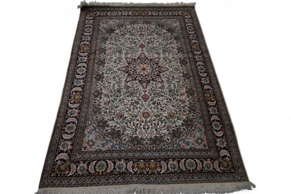 APPROX 4' X 6' HANDMADE WOOL RUG