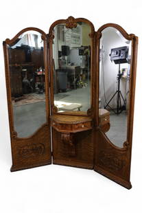 LARGE OAK DRESSING SCREEN VANITY: LARGE 3 PANEL OAK DRESSING SCREEN, TWO LOWER DRAWERS. ORNATE AMERICAN OAK DRESSING SCREEN. SOME VENEER CHIPS. 58" W x 68 H. THIS ITEM EXCEEDS SIZE OR WEIGHT LIMITATIONS FOR IN HOUSE SHIPPING, MUST BE