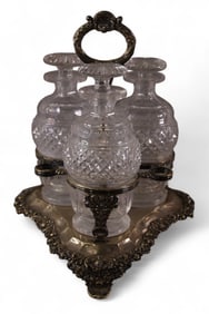 CRUET SET IN STERLING HOLDER